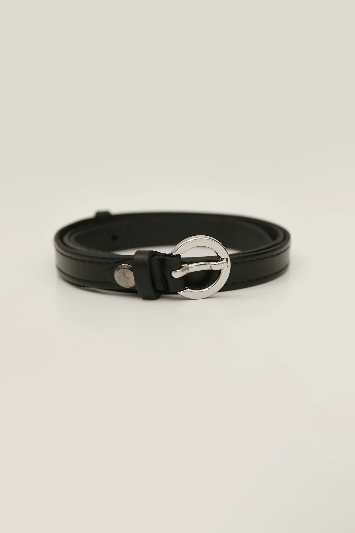 Black thin genuine leather belt with a silver metallic buckle, photo 1