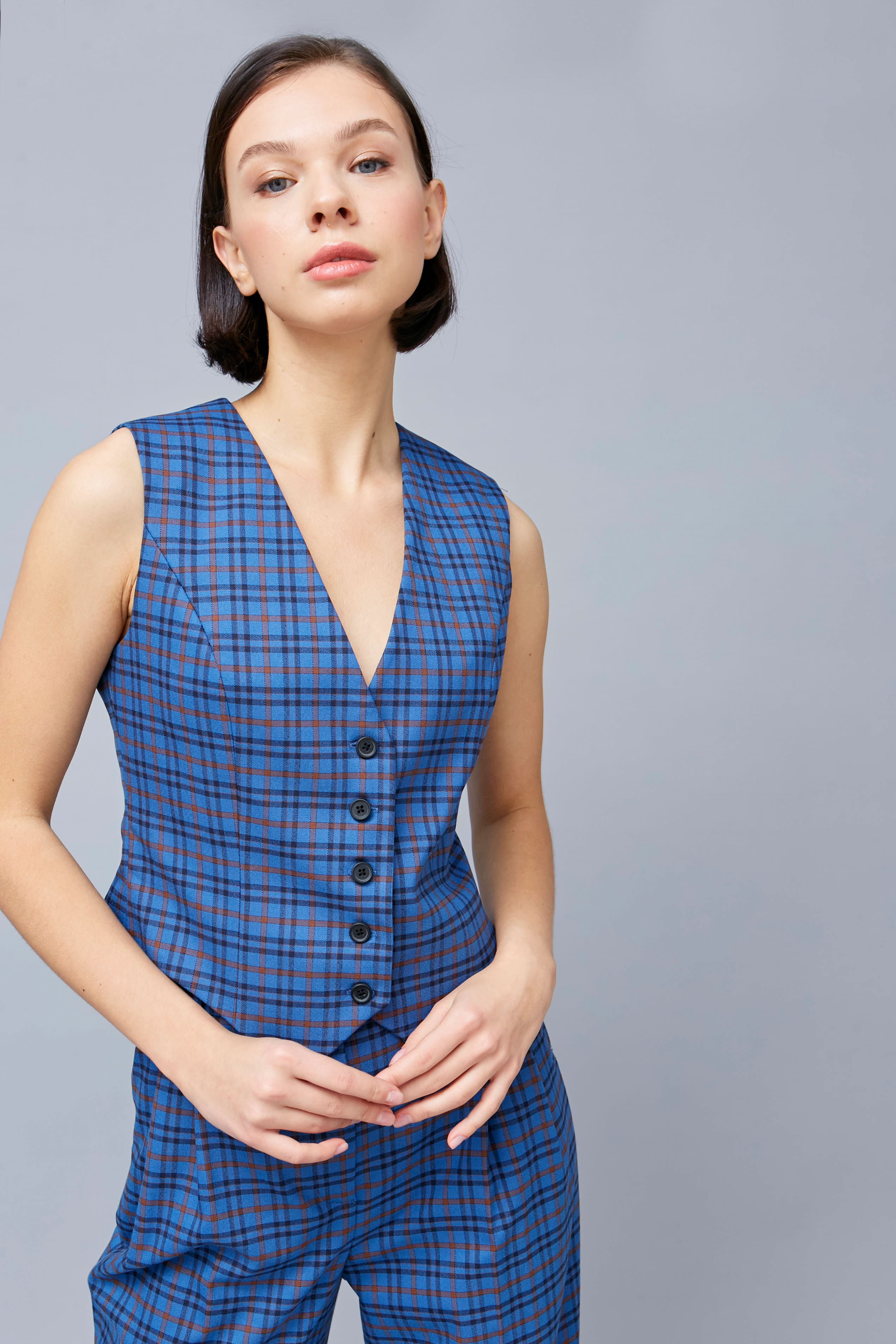 Vest with buttons in blue check, photo 1