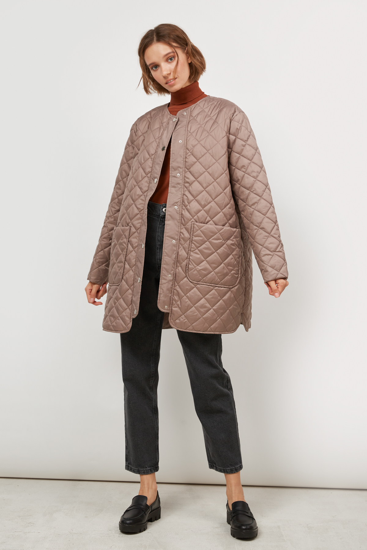 Brown puffer jacket with large pockets, photo 1