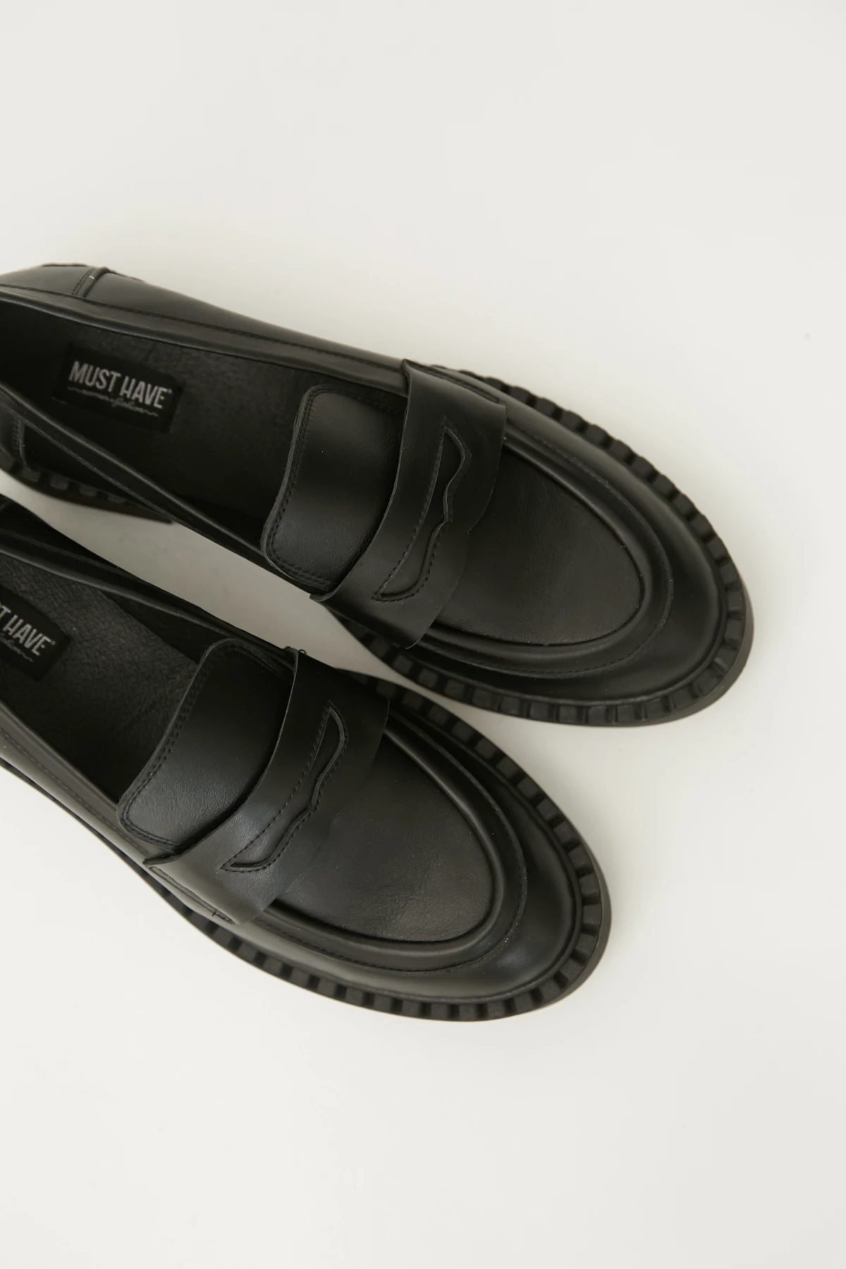 Black loafers on a massive sole made of genuine leather, photo 2