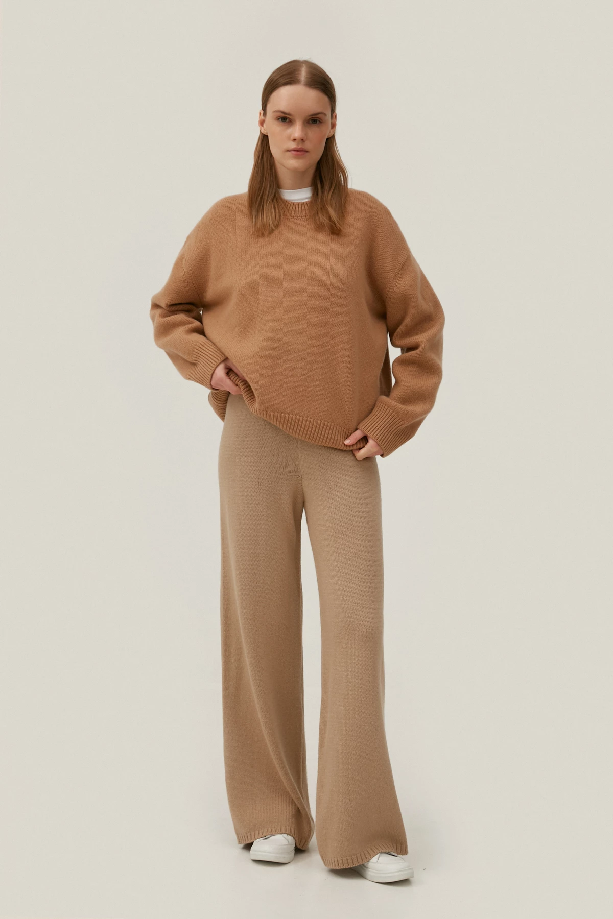 Beige knitted elongated pants with merino wool, photo 1
