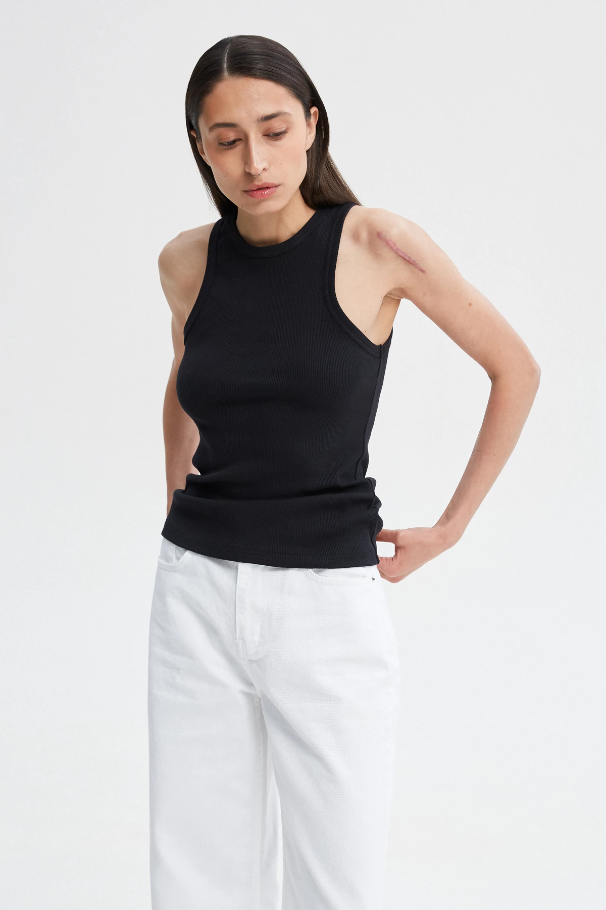 Black cotton ribbed tank top with an oval neckline, photo 1