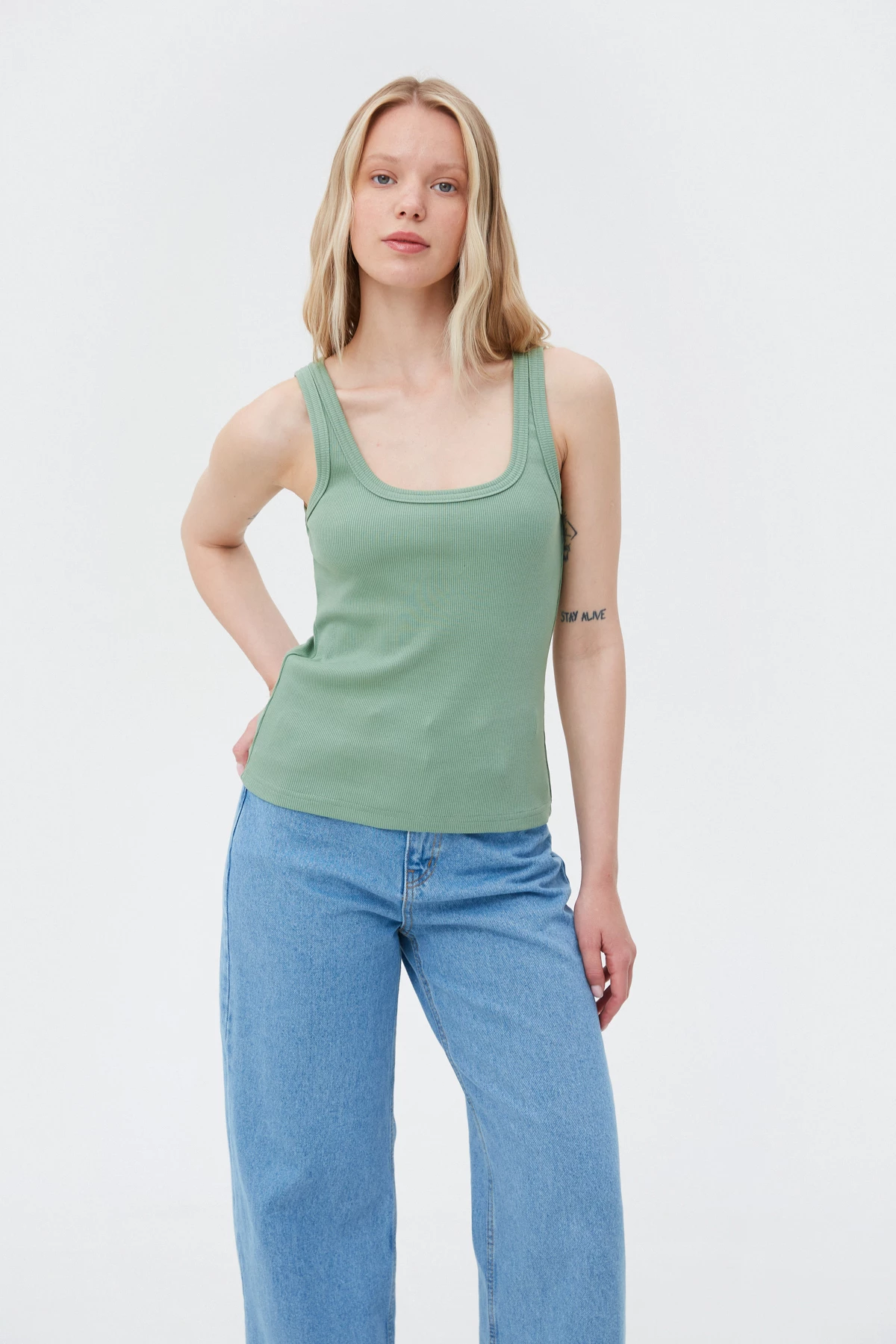 Pistachio cotton ribbed tank top with deep oval neckline, photo 1