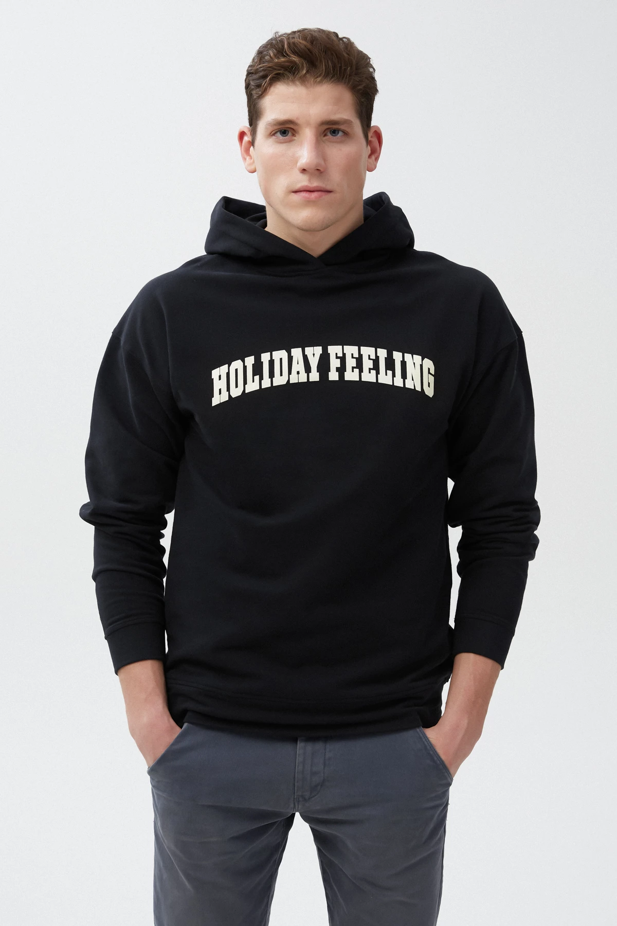 Black unisex hoodie "Holiday feeling" on fleece, photo 1