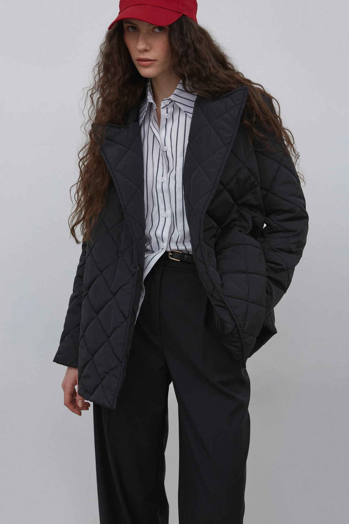Black quilted jacket with with padding and belt, photo 1