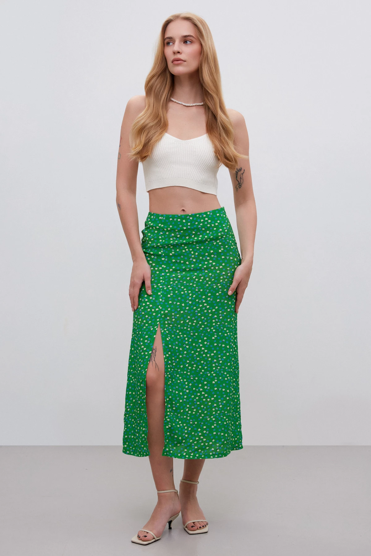 Green midi skirt with a cut in the print "white flowers" made of viscose, photo 1
